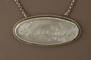 Cloudscape Oval Pendant, July 2008, back carved acrylic and sterling silver, 12" x 3" x .5"