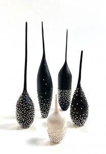 photo of 5 vases of irregular shapes