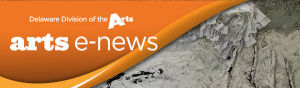 Delaware Division of the Arts arts e news logo on an orange banner in the upper left hand corner over Denise Eno Ernests painting Prayer Tree in the Bleak Mid Winter 2021 that features tree branches attached to a canvas painted with silver, white, gray, and black paints