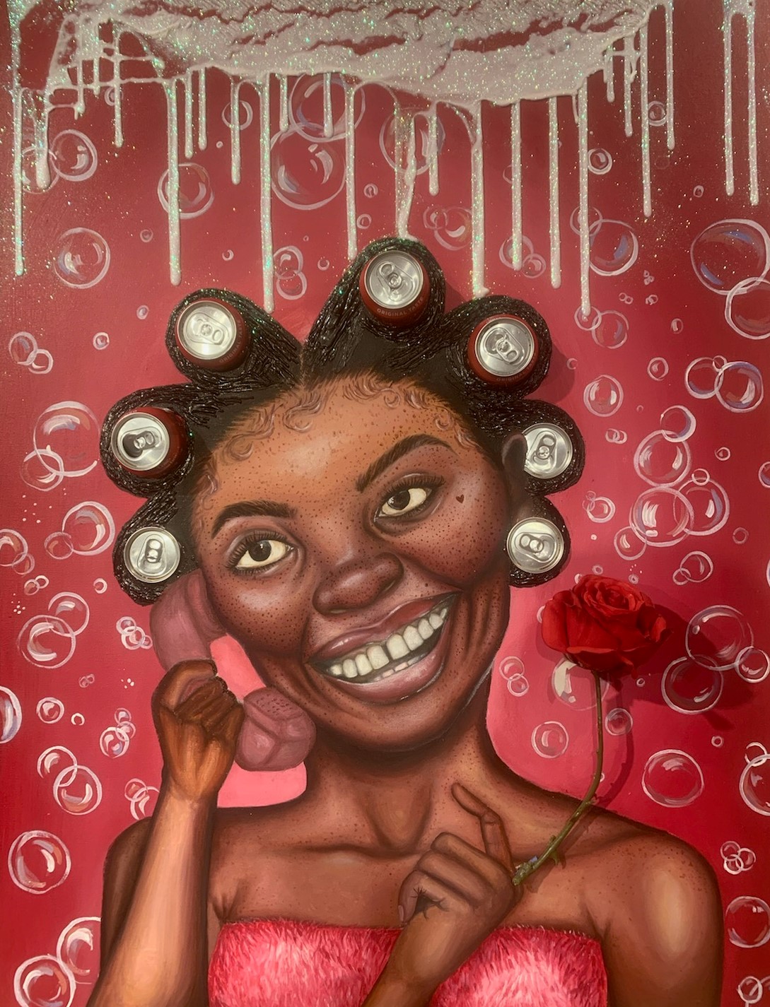 Portrait of a woman on the phone with rollers in her hair
