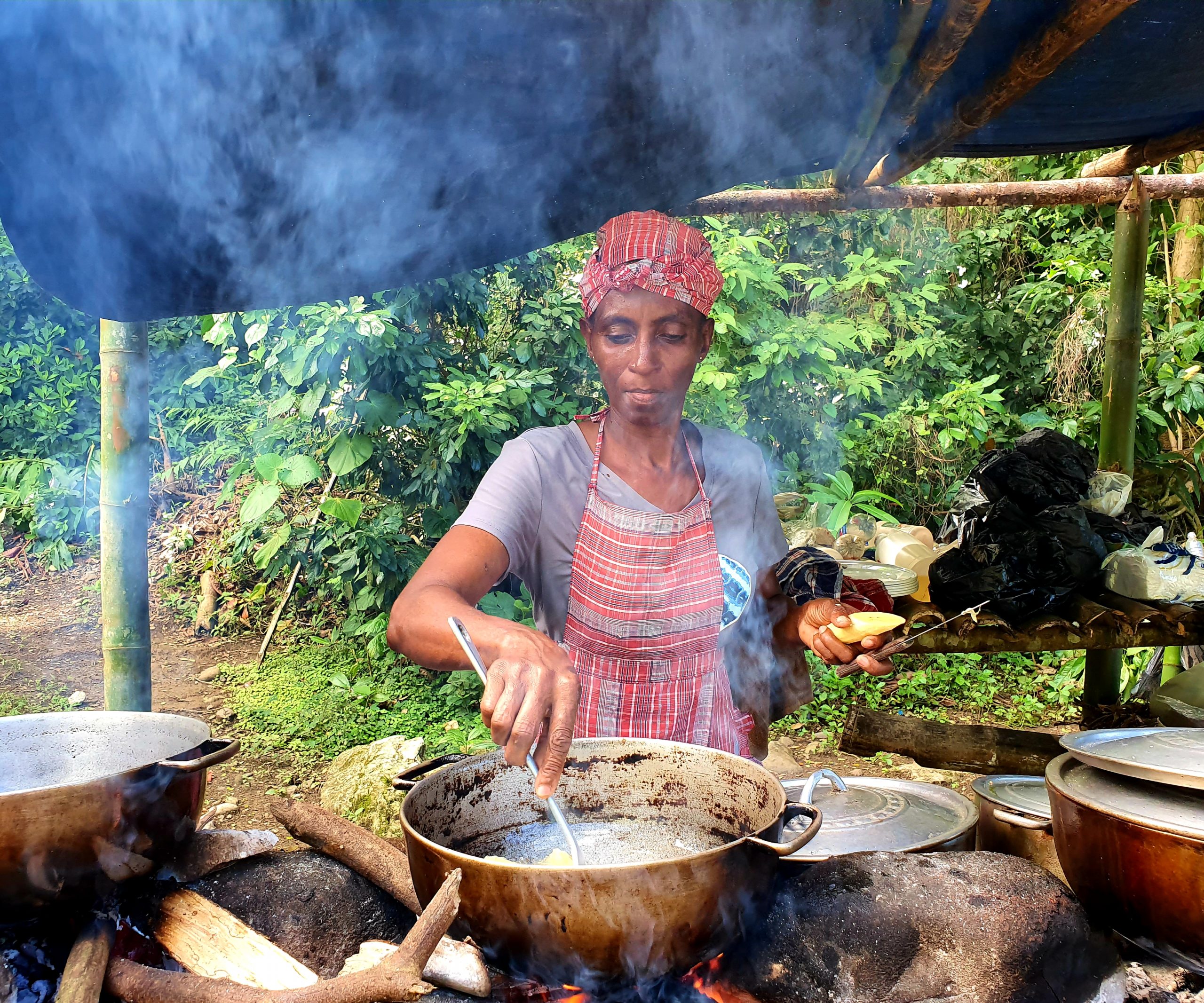 photo of a woman stirring a pot