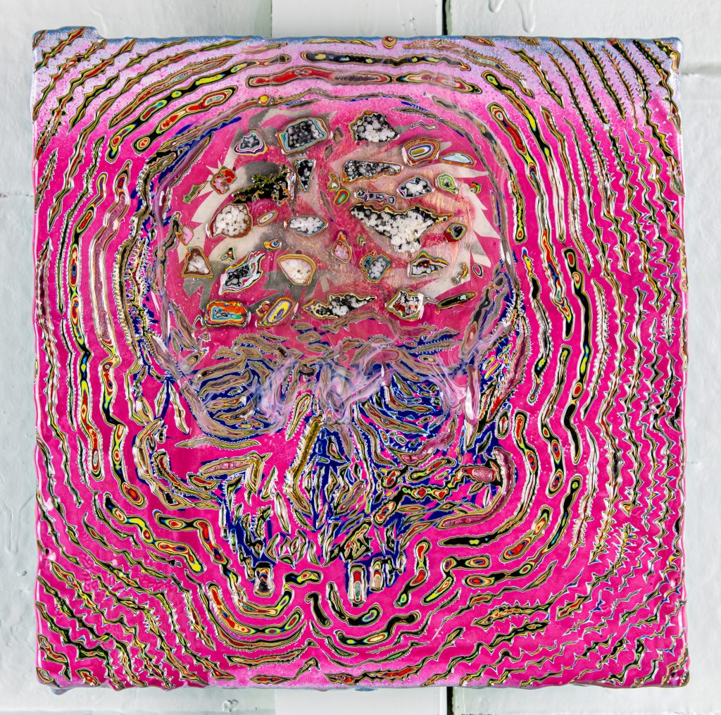 A painting of a pink skull made from lines and textures on a canvas.