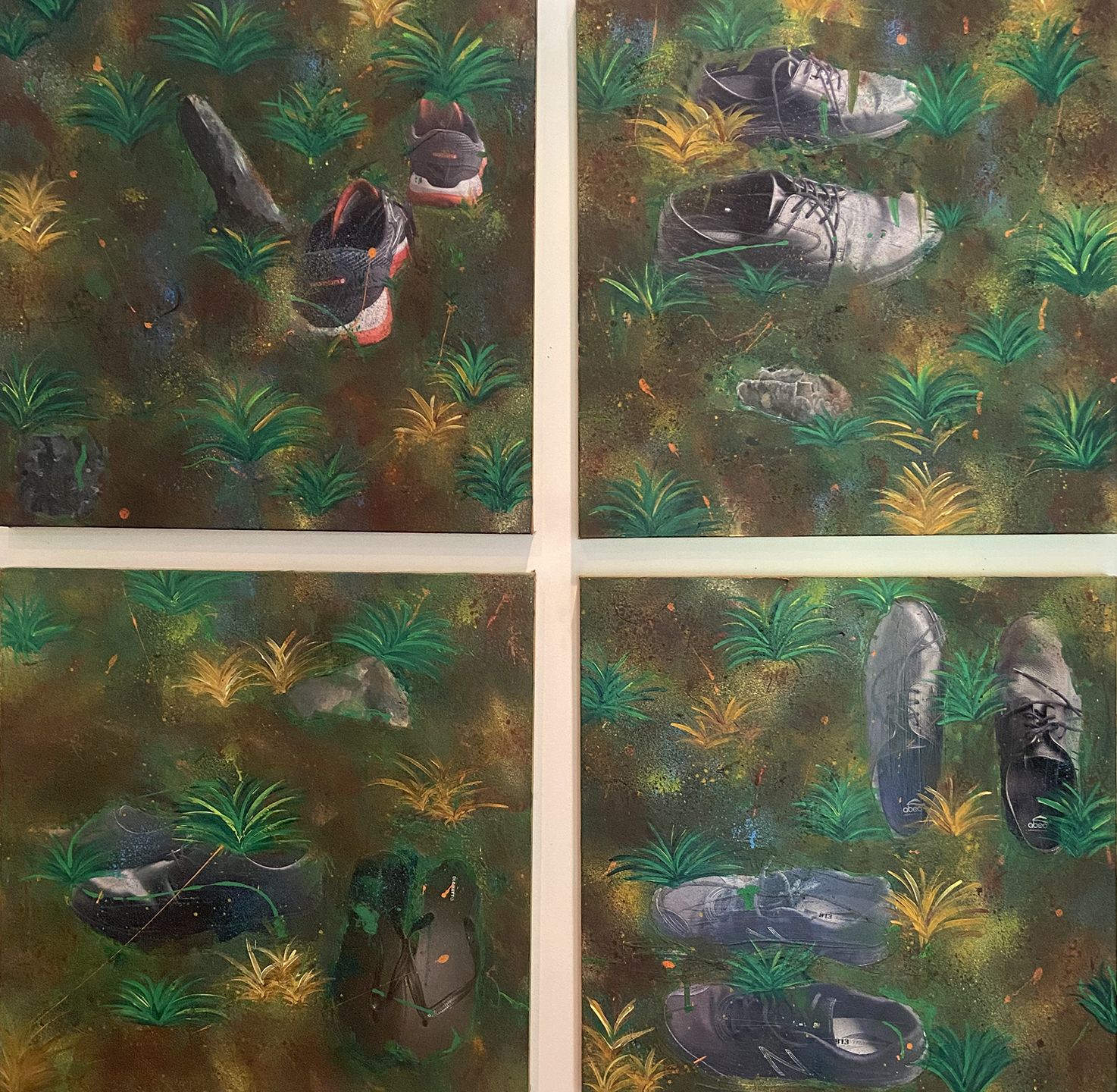 Four squares with painted grass and shoes in each square.