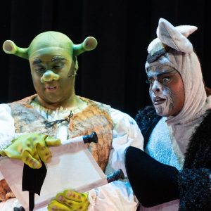 two characters from Shrek the musical