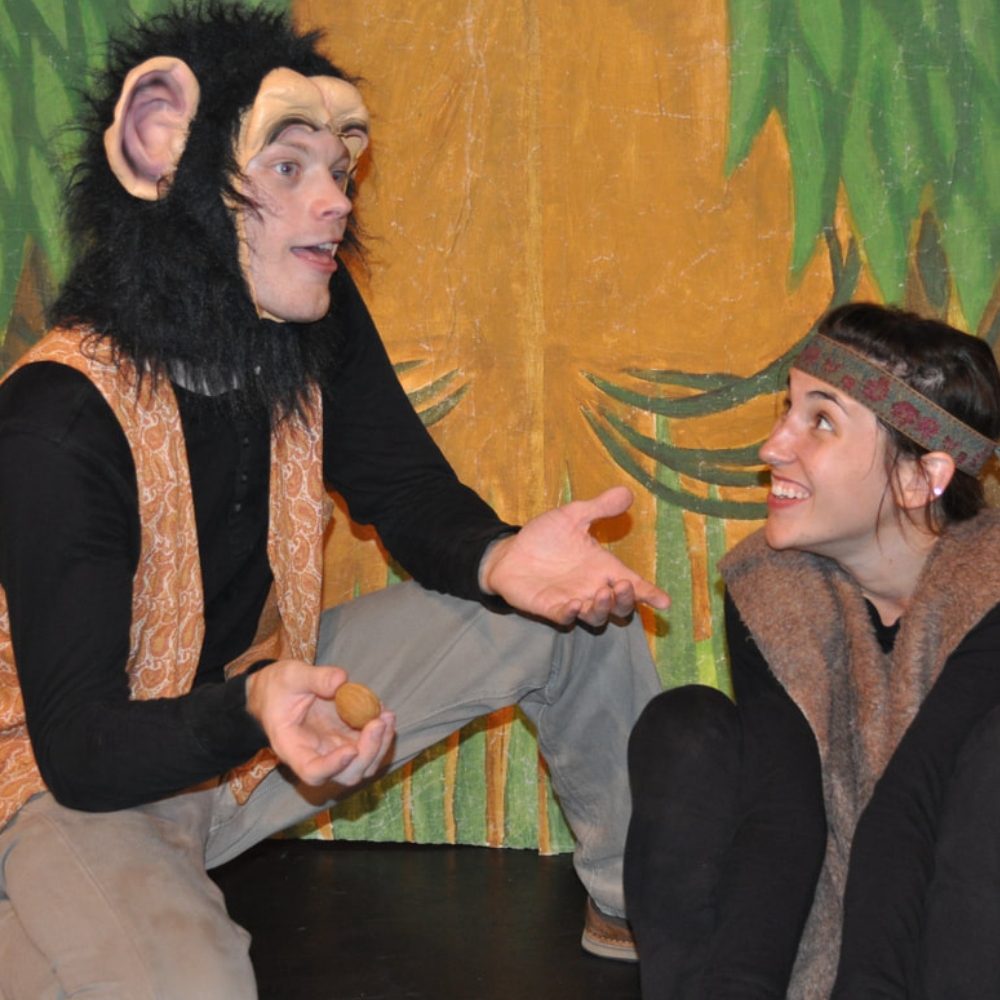 two actors acting out the jungle book